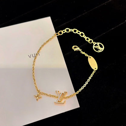 [AW]LOGO STAR MOTIF GOLD BRACELET