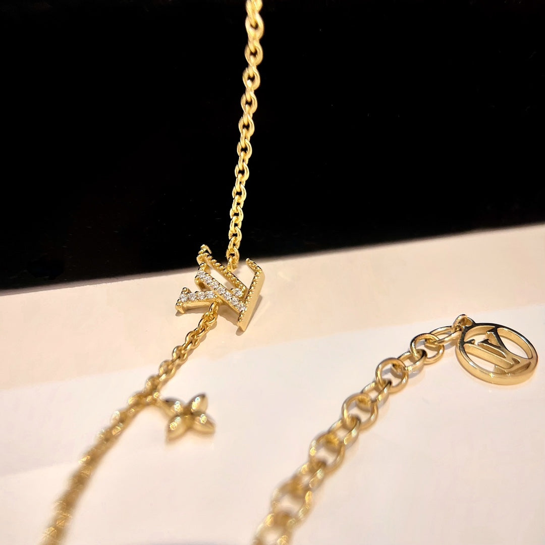 [AW]LOGO STAR MOTIF GOLD BRACELET