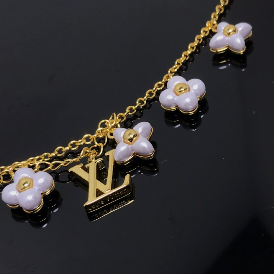 [AW]LOGO 6 MOTIF STAR AND SUN GOLD BRACELET